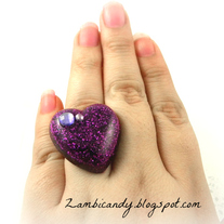 Adjustable sparkly purple resin ring