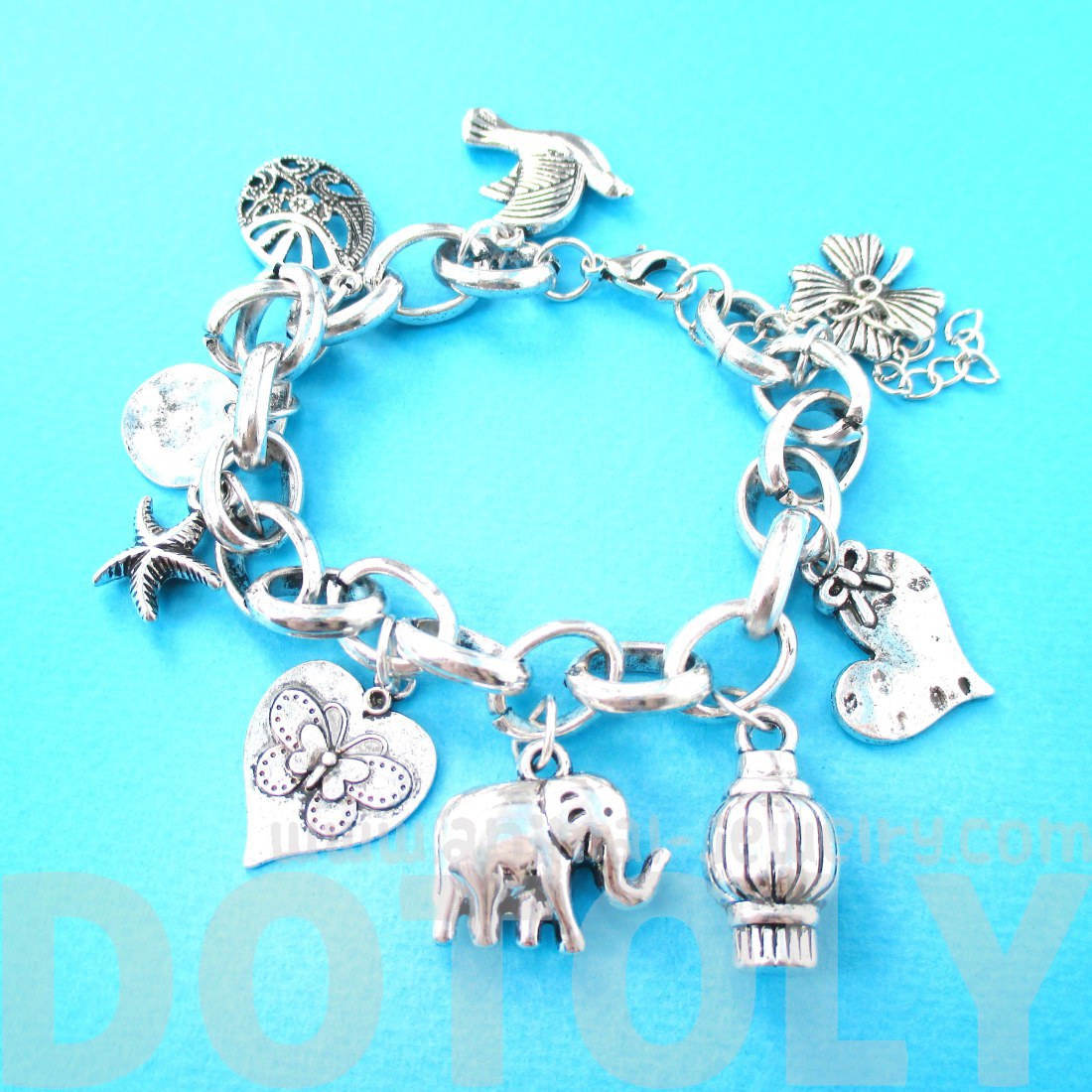 Elephant Starfish Doves Animal Shaped Charm Bracelet in Silver · DOTOLY Animal Jewelry · The