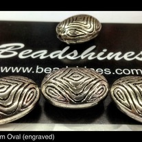 Engraved Oval beads (dz) 25mm x 10mm