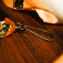 Orange Acrylic and Brass Tassel Earrings