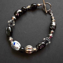 6" Black and white beaded wire bracelet