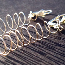 1" Silver twirl wire earrings