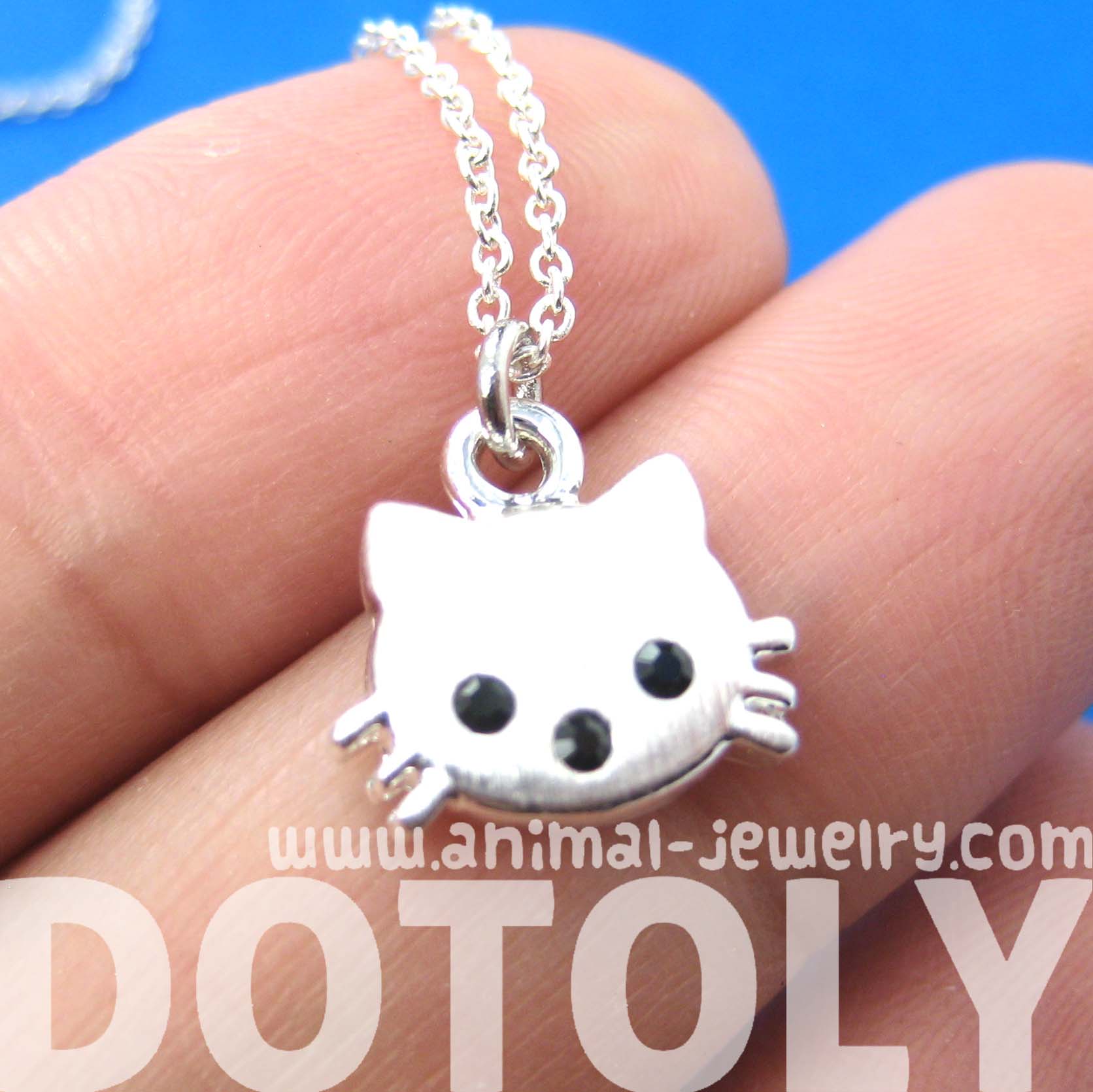 Small and Pretty Kitty Cat Animal Charm Necklace in Silver · DOTOLY