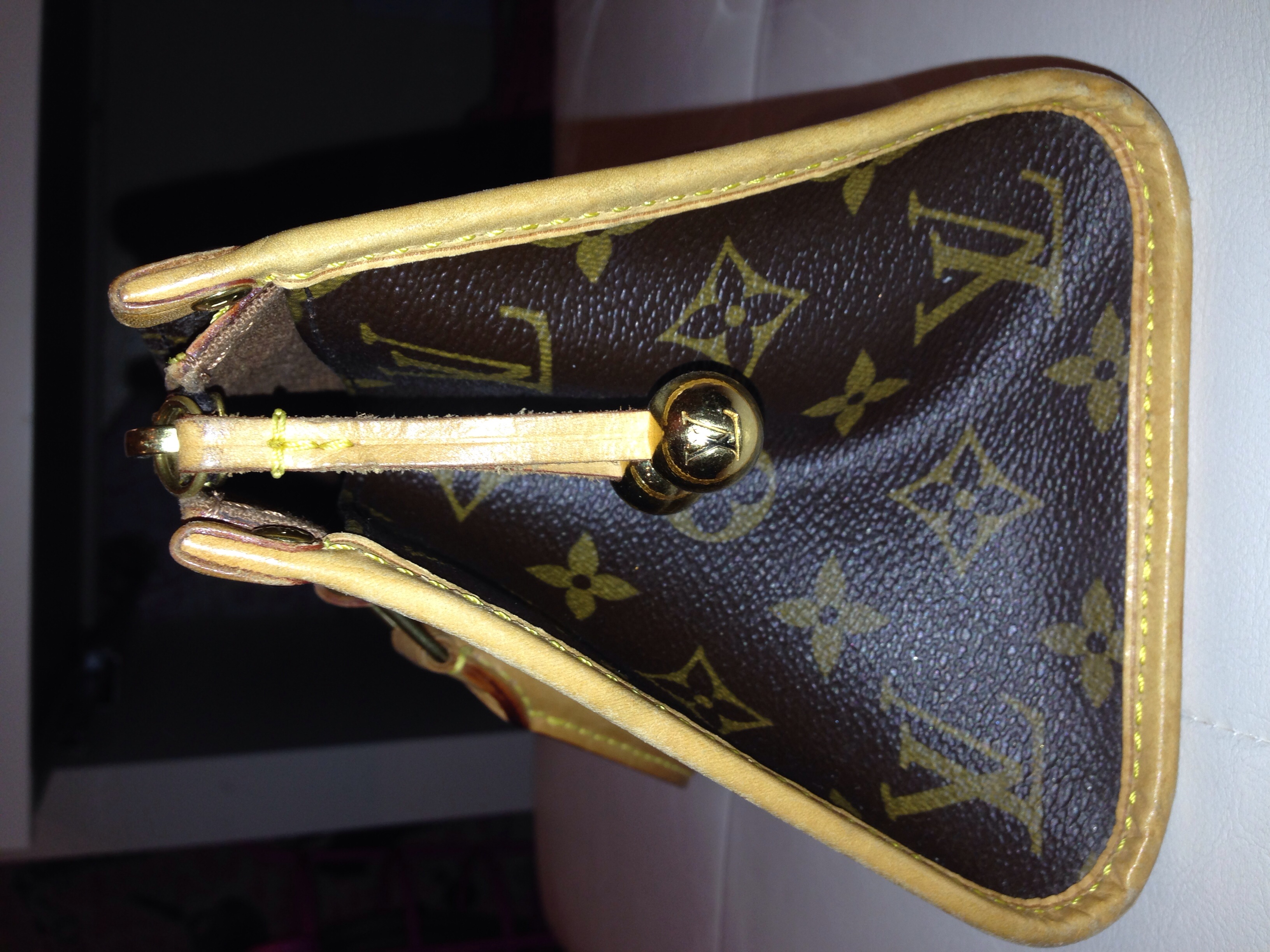 louis vuitton triangle bag