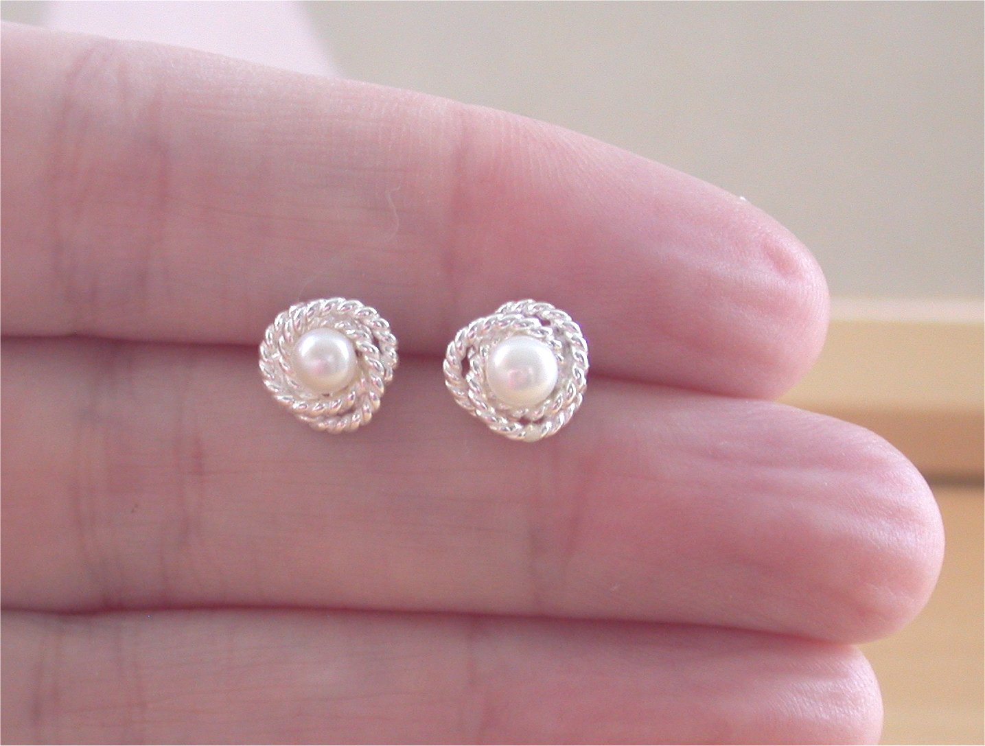 white pearl studs
